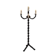 Iron candelabra · yellow candles